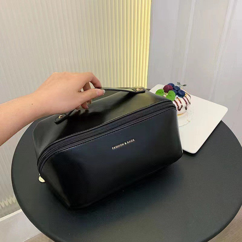 PU organ pillow cosmetic bag female portable large capacity travel portable ins high-end wash makeup storage bag