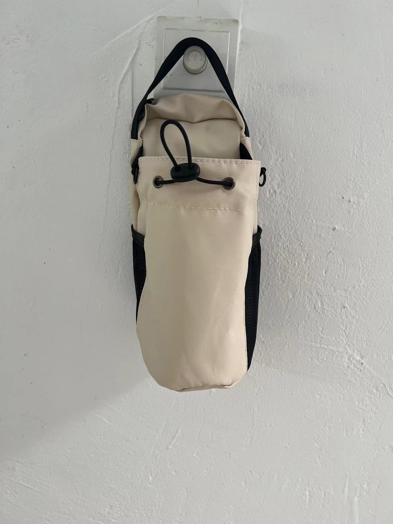 Cross-border hot-selling fitness magnetic water bottle bag water cup messenger bag gym phone key storage bag source spot